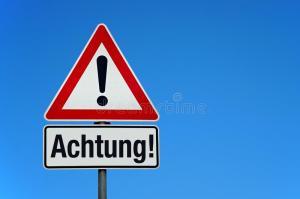 attention-warning-sign-blue-sky-german-text-achtung-translation-attention-attention-warning-sign-german-text-150909877